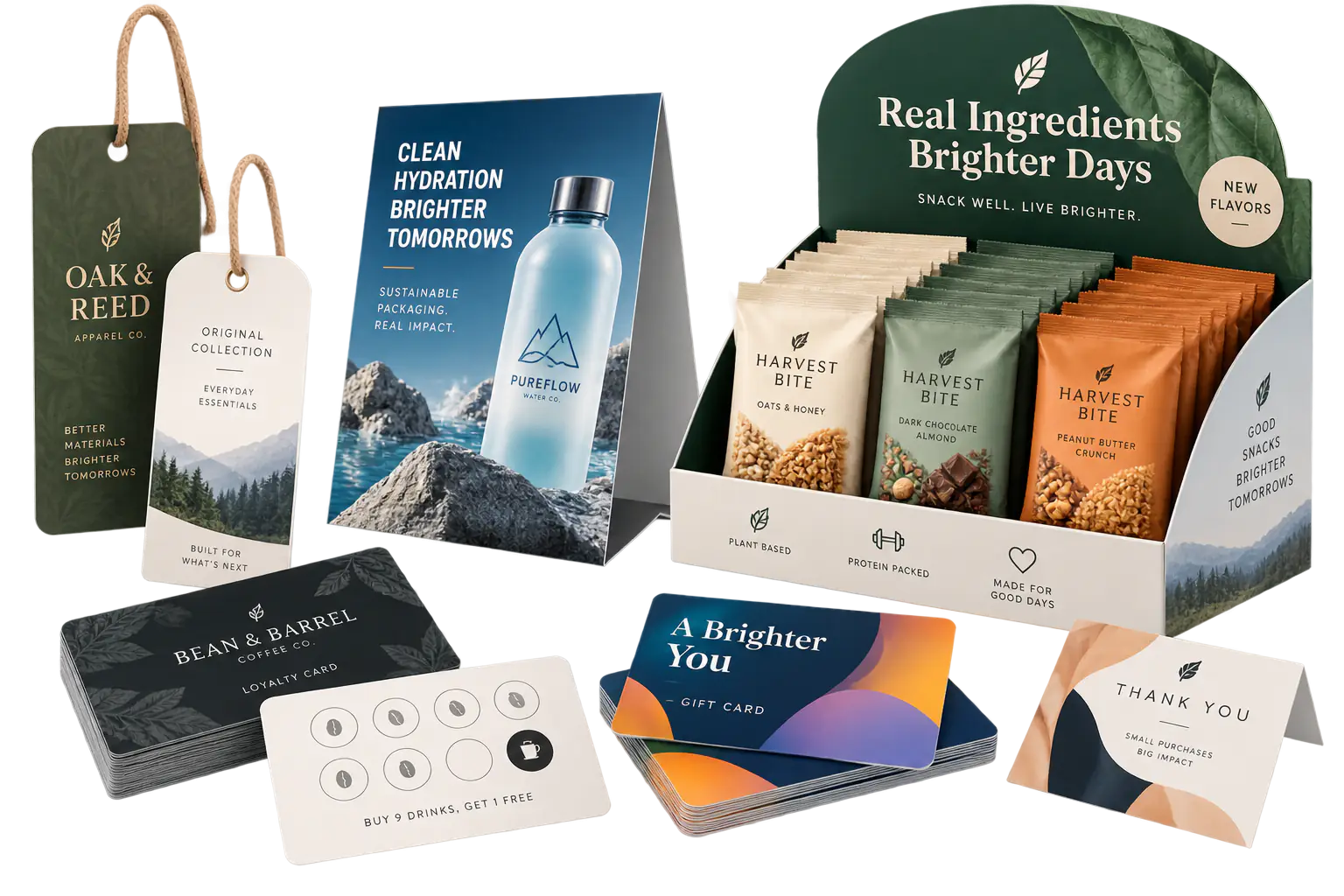 Gift cards, loyalty cards, hang tags, and retail display pieces arranged on a studio surface.